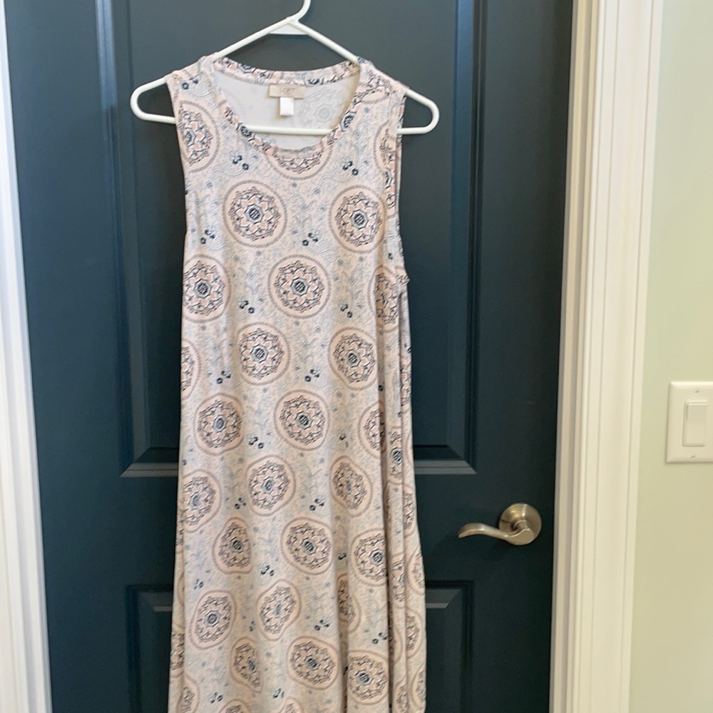 Sleeveless swing dress. Size L
